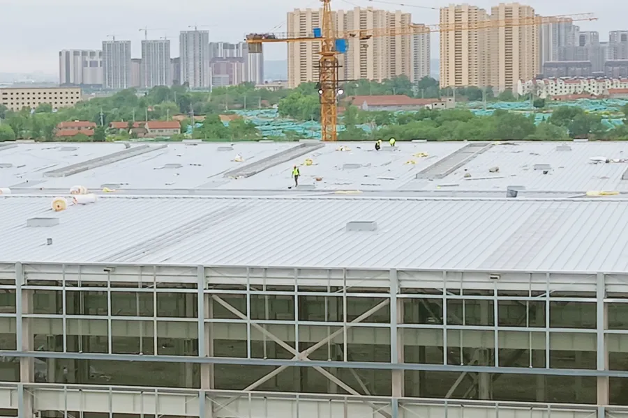 Metal roof waterproofing project during construction